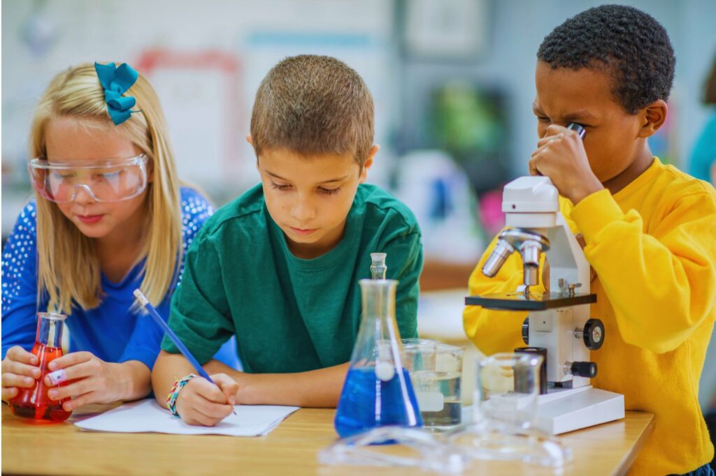 students experimenting in chemistry lab