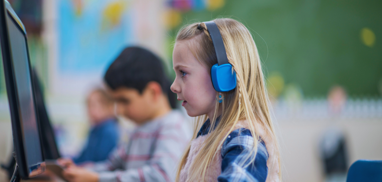 girl using multimedia in school